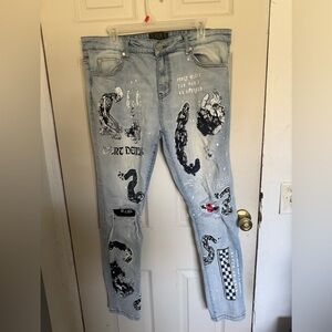 Light Wash Skinny Jeans with Black Graphic Print